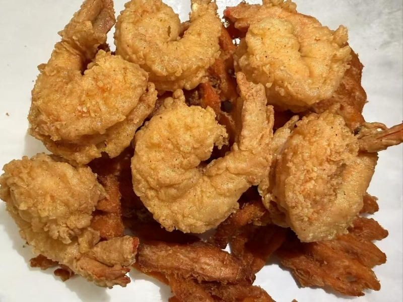Golden crispy fried shrimp with crunchy coating at 101 Crab, a Seafood Restaurant in Santa Maria