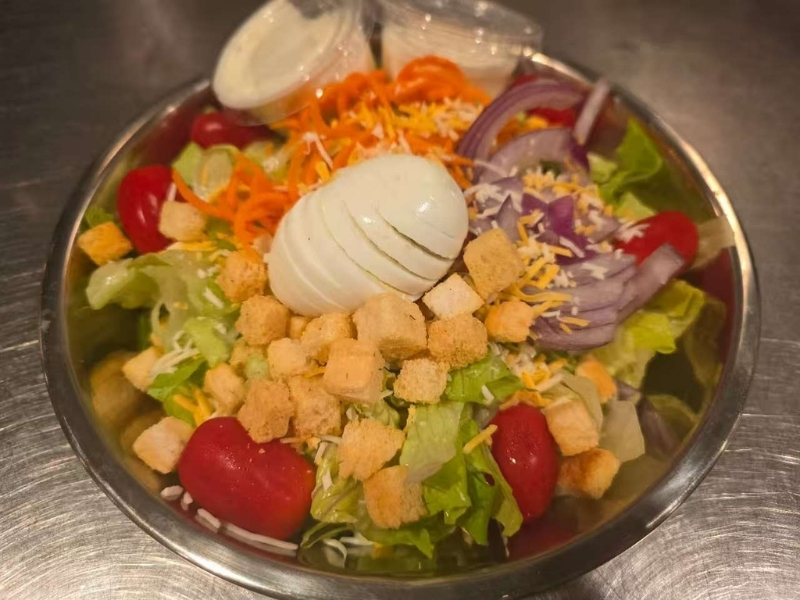 Fresh garden salad with egg, croutons and veggies at 101 Crab, a Seafood Restaurant in Santa Maria
