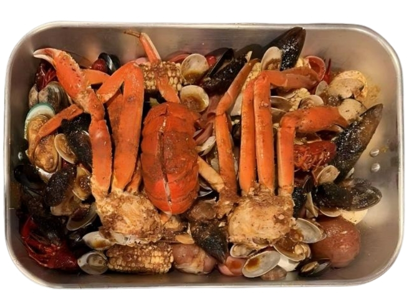 Loaded seafood boil with crab, clams, mussels and sides at 101 Crab, a Seafood Restaurant in Santa Maria