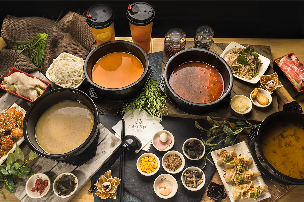Various flavored soup bases at Ten Seconds Yunnan Rice Noodles，a Chinese Restaurant in New York