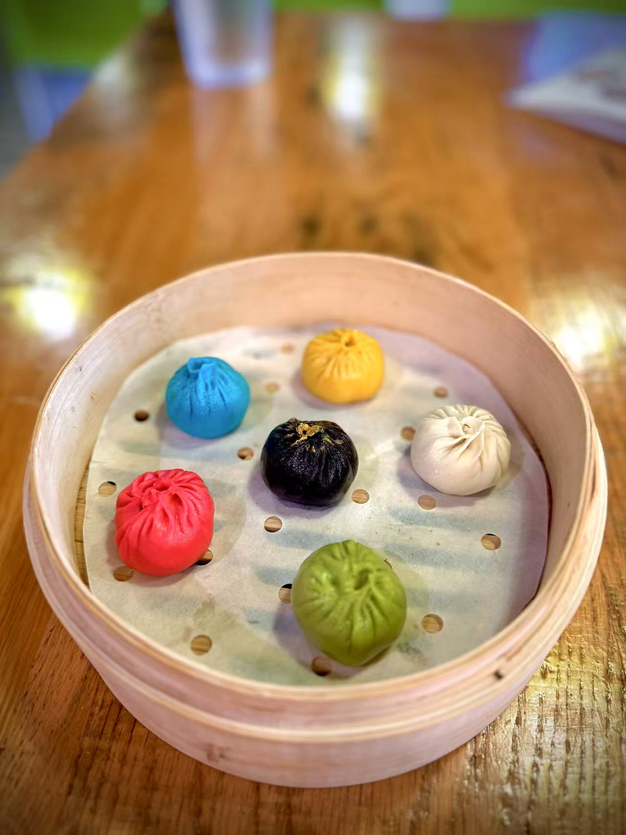 Colorful xiaolongbao in a steamer at 18 Dough，a Chinese Restaurant in Las Vegas