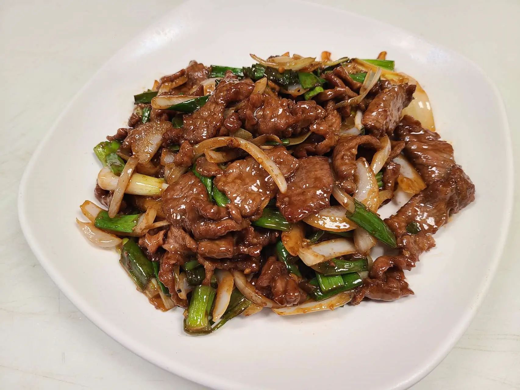 Stir‑fried beef with green onions and onions at 1st Dumpling N Noodle, a Chinese Restaurant in CA
