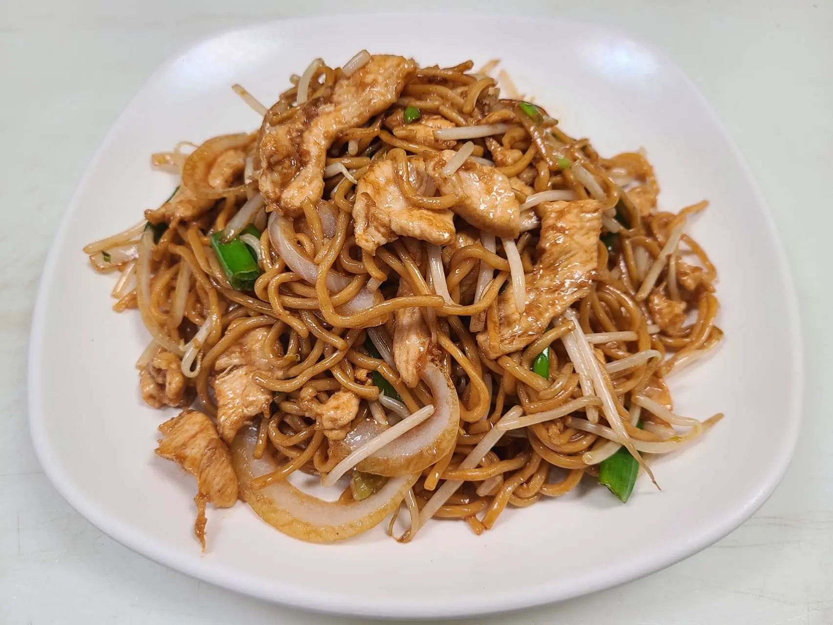 Stir‑fried noodles with chicken, bean sprouts and green onions at 1st Dumpling N Noodle, a Chinese Restaurant in CA
