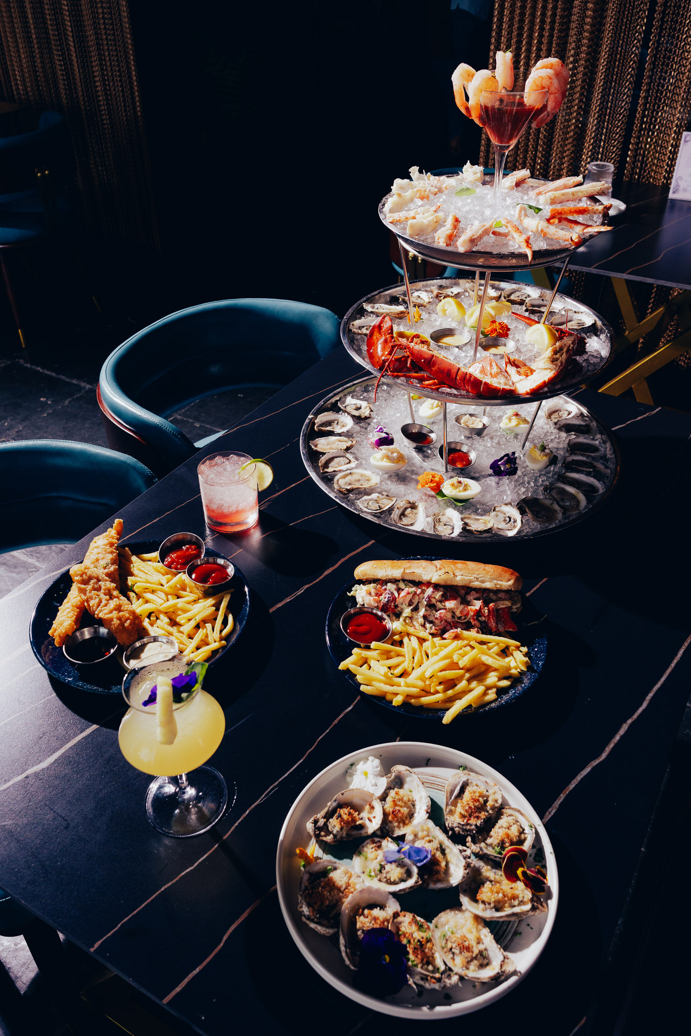Full seafood platter set with drinks and side dishes
