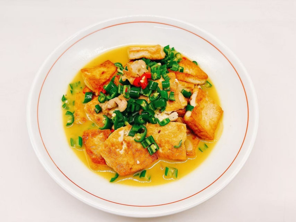 Home - style tofu cooked with minced meat and green peppers at 28° North Old Changsha, a Chinese Restaurant in Rowland Heights.