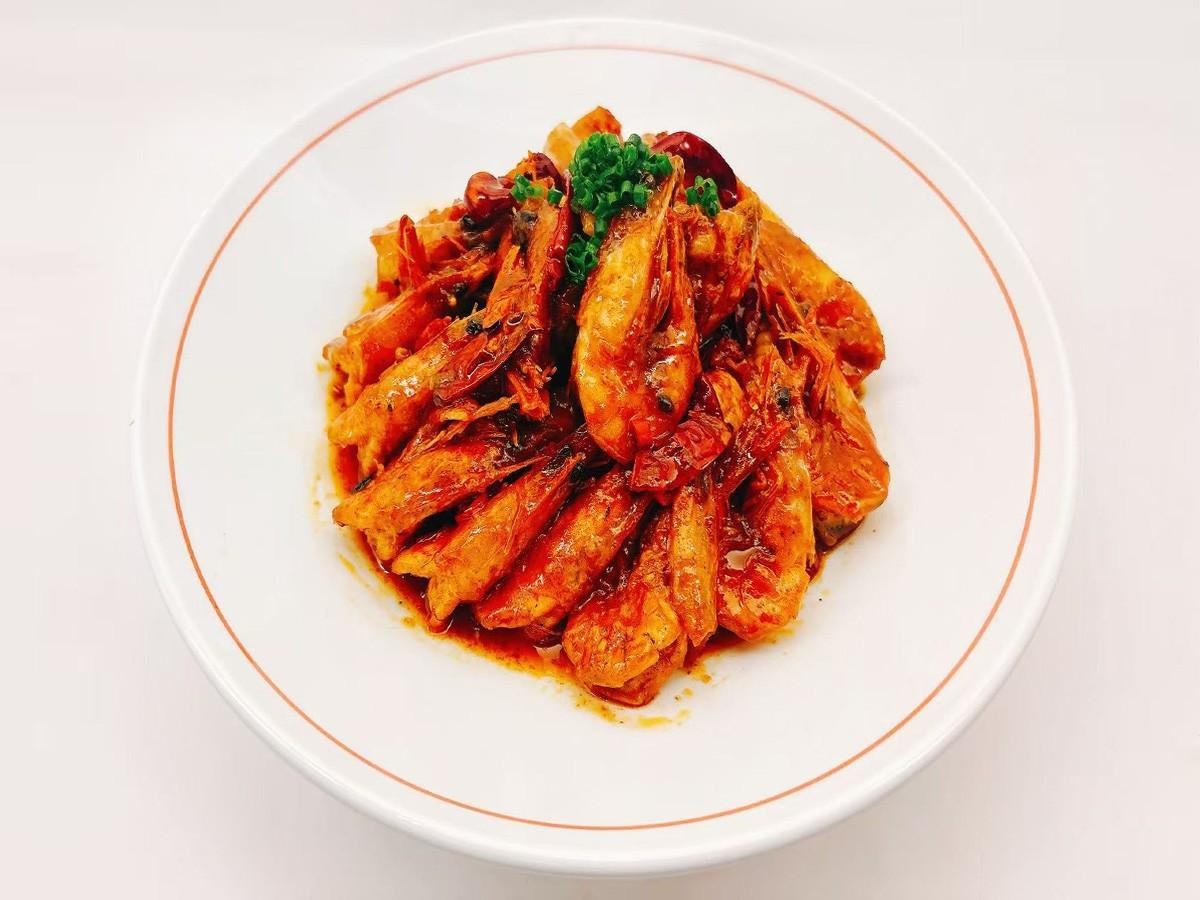 Spicy - flavored shrimp garnished with scallions at 28° North Old Changsha, a Chinese Restaurant in Rowland Heights.
