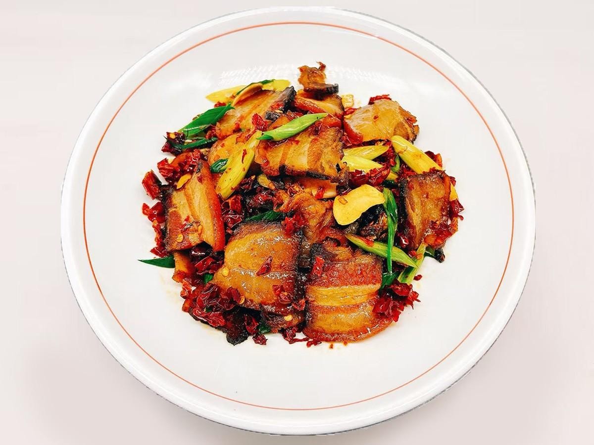 Cured meat stir - fried with garlic leaves at 28° North Old Changsha, a Chinese Restaurant in Rowland Heights.