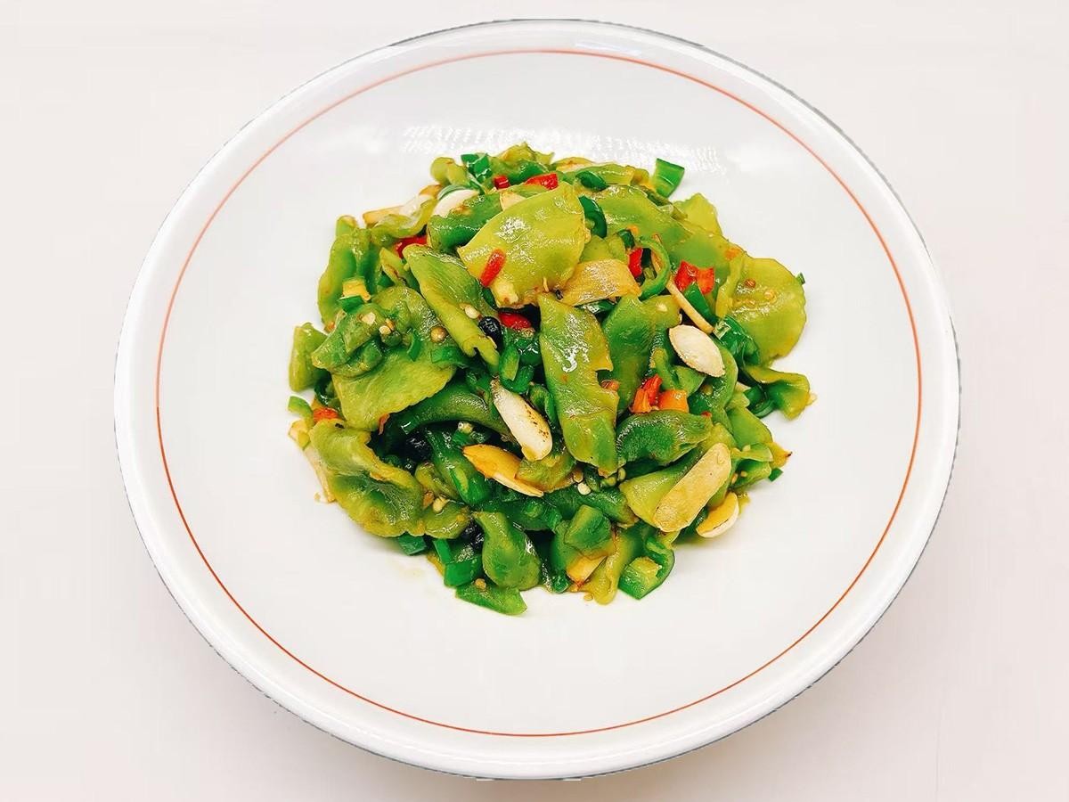 Simple stir - fried lettuce with seasonings at 28° North Old Changsha, a Chinese Restaurant in Rowland Heights.
