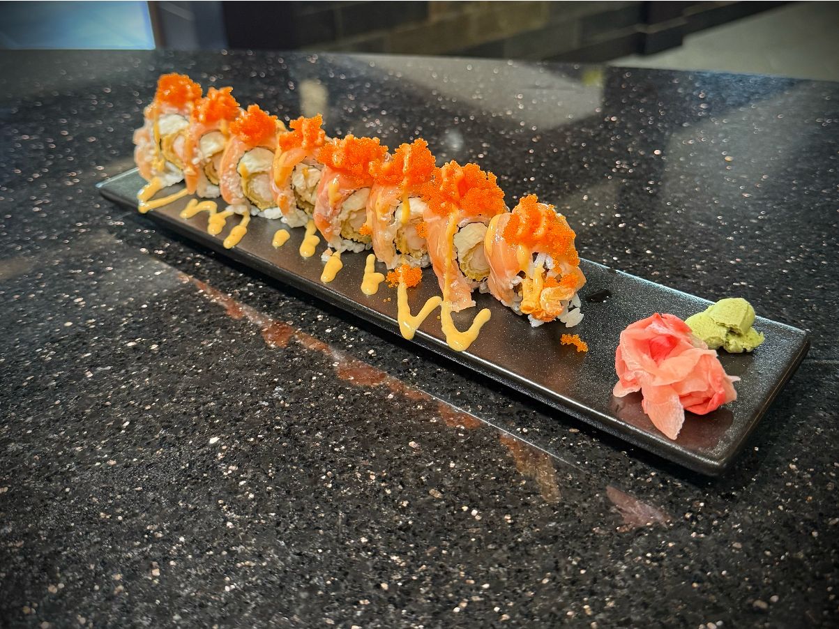 Fire Dragon sushi roll with spicy seafood toppings and garnish at 592 Korean BBQ, an Asian Fusion Restaurant in Appleton