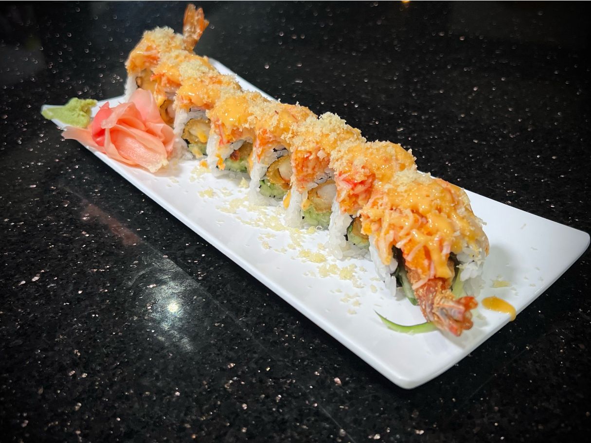 Godzilla sushi roll with crispy tempura and flavorful garnish at 592 Korean BBQ, an Asian Fusion Restaurant in Appleton