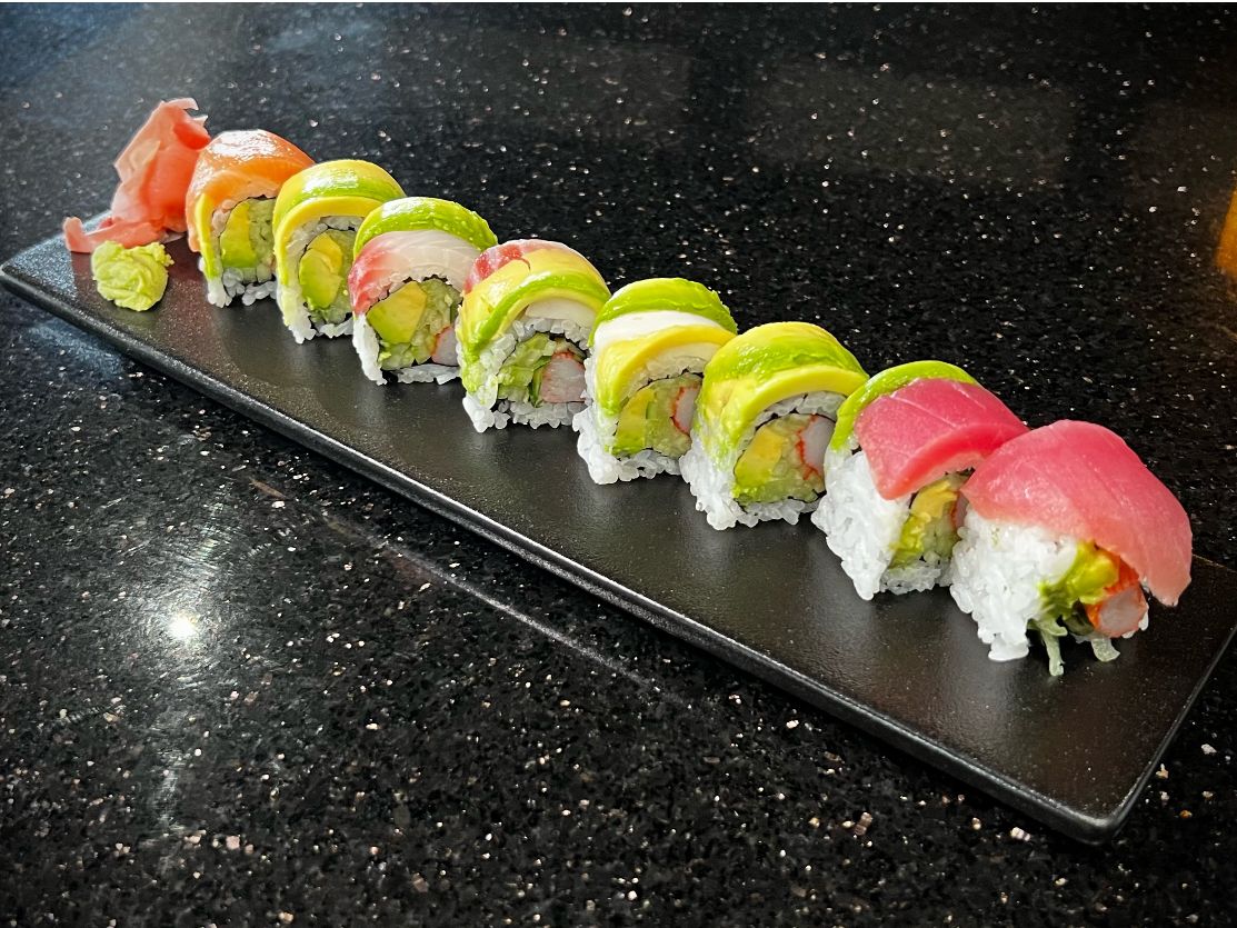 Rainbow sushi roll topped with assorted fresh colorful raw fish slices at 592 Korean BBQ, an Asian Fusion Restaurant in Appleton