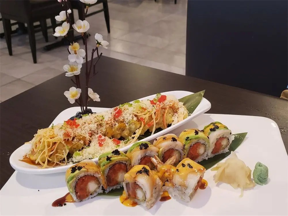 Crunchy-topped sushi rolls with sauces at E Sushi & Grill, a Japanese Restaurant in Apollo Beach