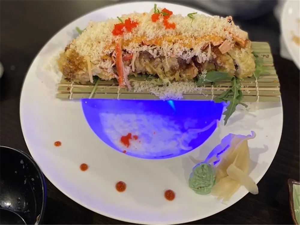 Crispy-topped sushi roll with tobiko at E Sushi & Grill, a Japanese Restaurant in Apollo Beach