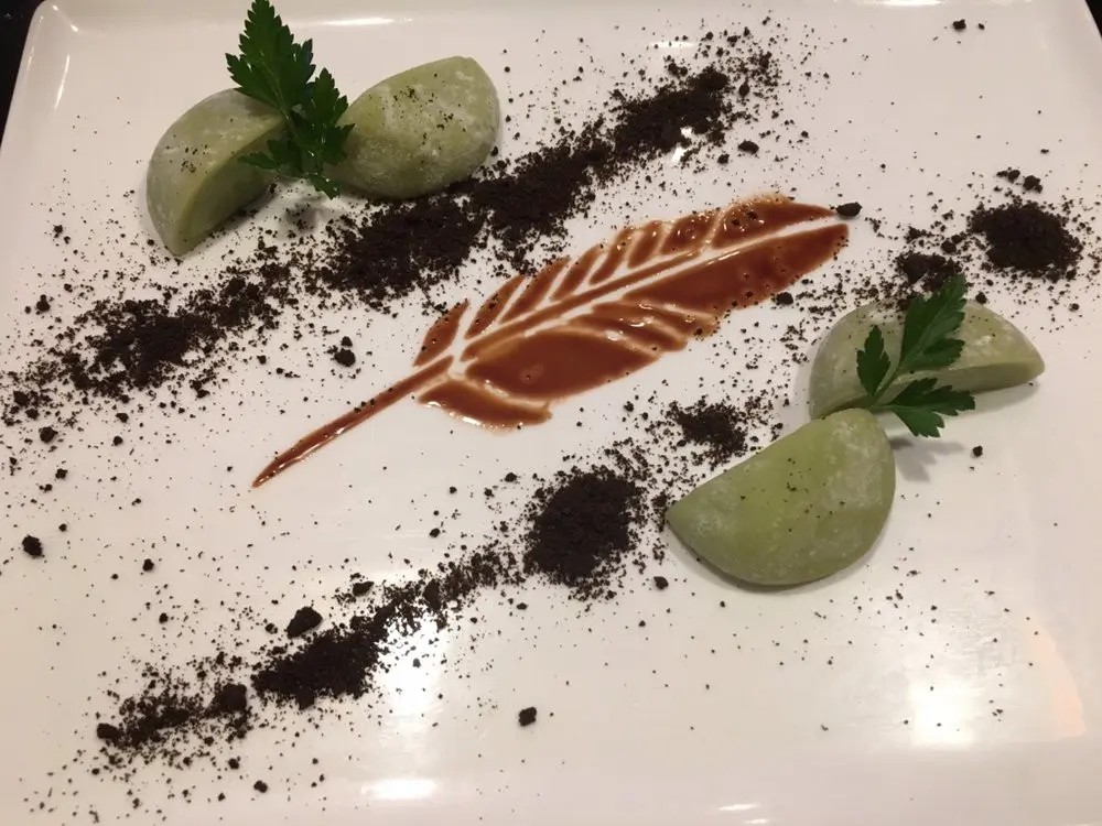 Green dumplings with sauce and crumbs at E Sushi & Grill, a Japanese Restaurant in Apollo Beach