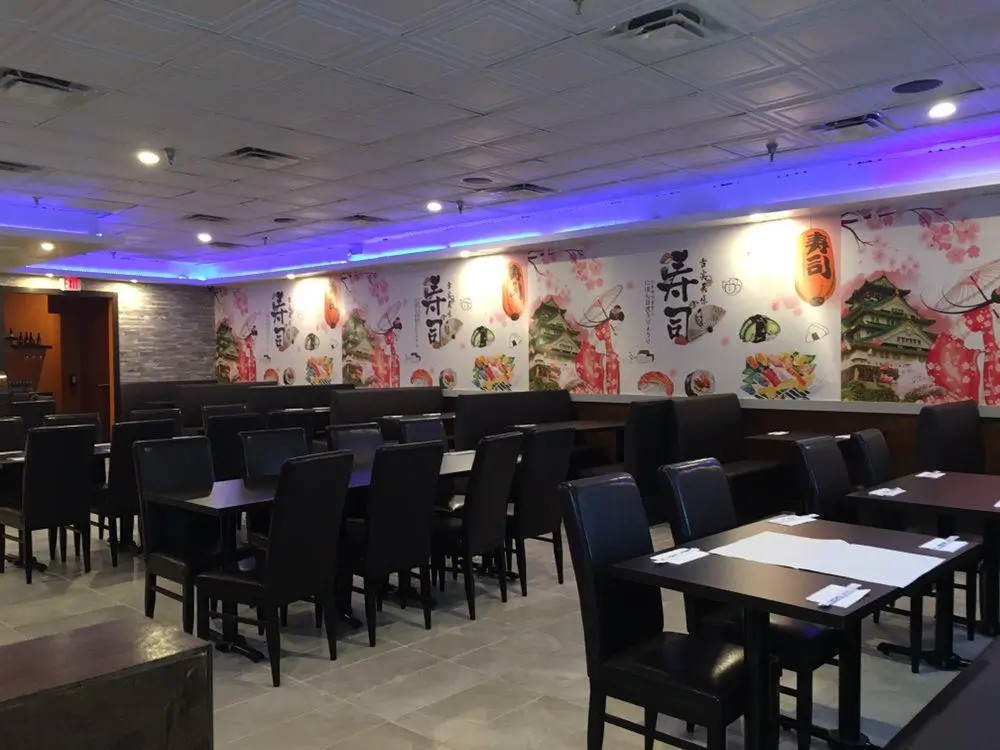 Dining space with decorative mural at E Sushi & Grill, a Japanese Restaurant in Apollo Beach