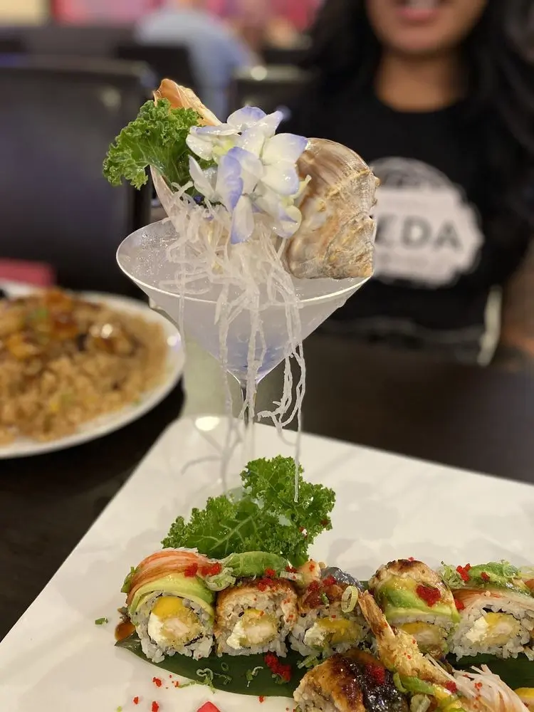 Tuna-topped sushi rolls with garnishes at E Sushi & Grill, a Japanese Restaurant in Apollo Beach