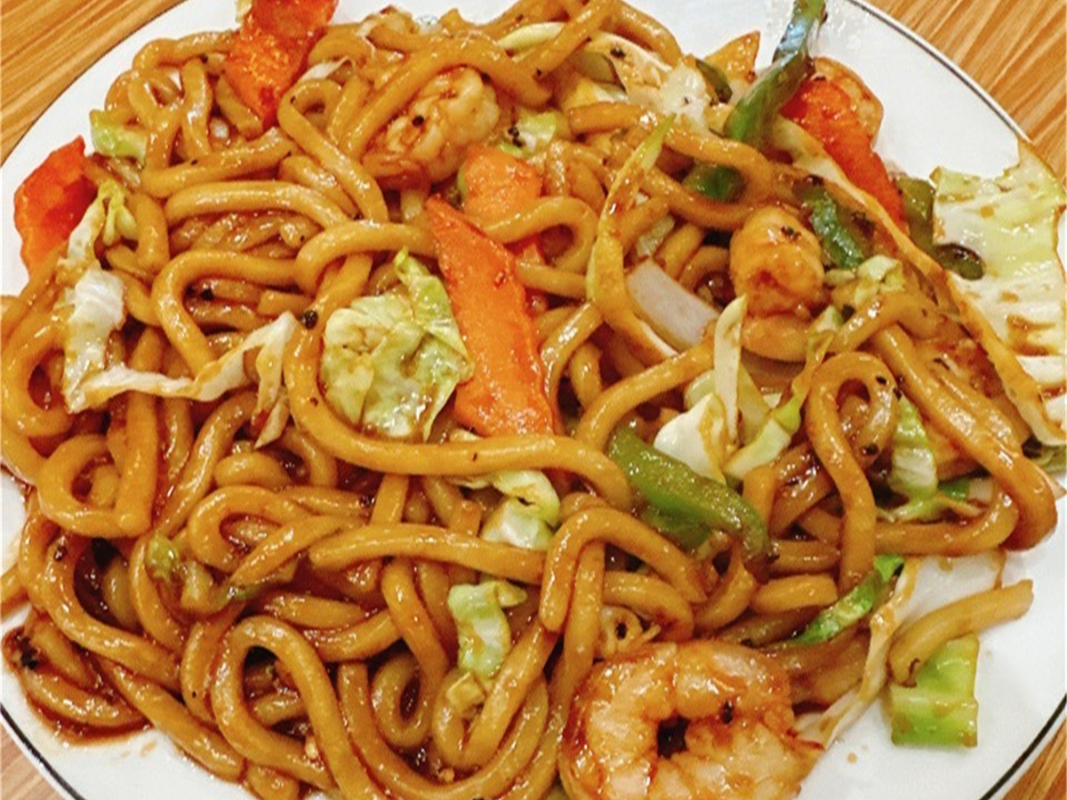 Shrimp Black Pepper Stir - fried Udon Noodles, noodles stir - fried with shrimp in a black pepper sauce at Seven Folding Dumpling House，a Chinese Restaurant in Mission Viejo