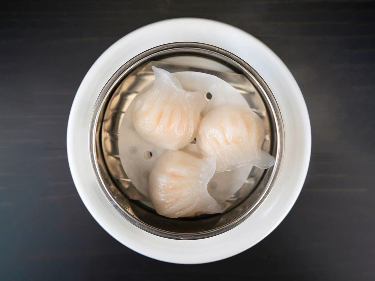 Shrimp Dumplings in a small bowl, with translucent wrappers revealing the shrimp filling inside at Seven Folding Dumpling House，a Chinese Restaurant in Mission Viejo