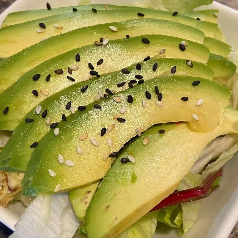 85-Asian-Fusion-Asian-Restaurant-Avocado-Salad-Choctaw Avocado salad with sesame seeds at 85 Asian Fusion, a Asian Restaurant in Choctaw.