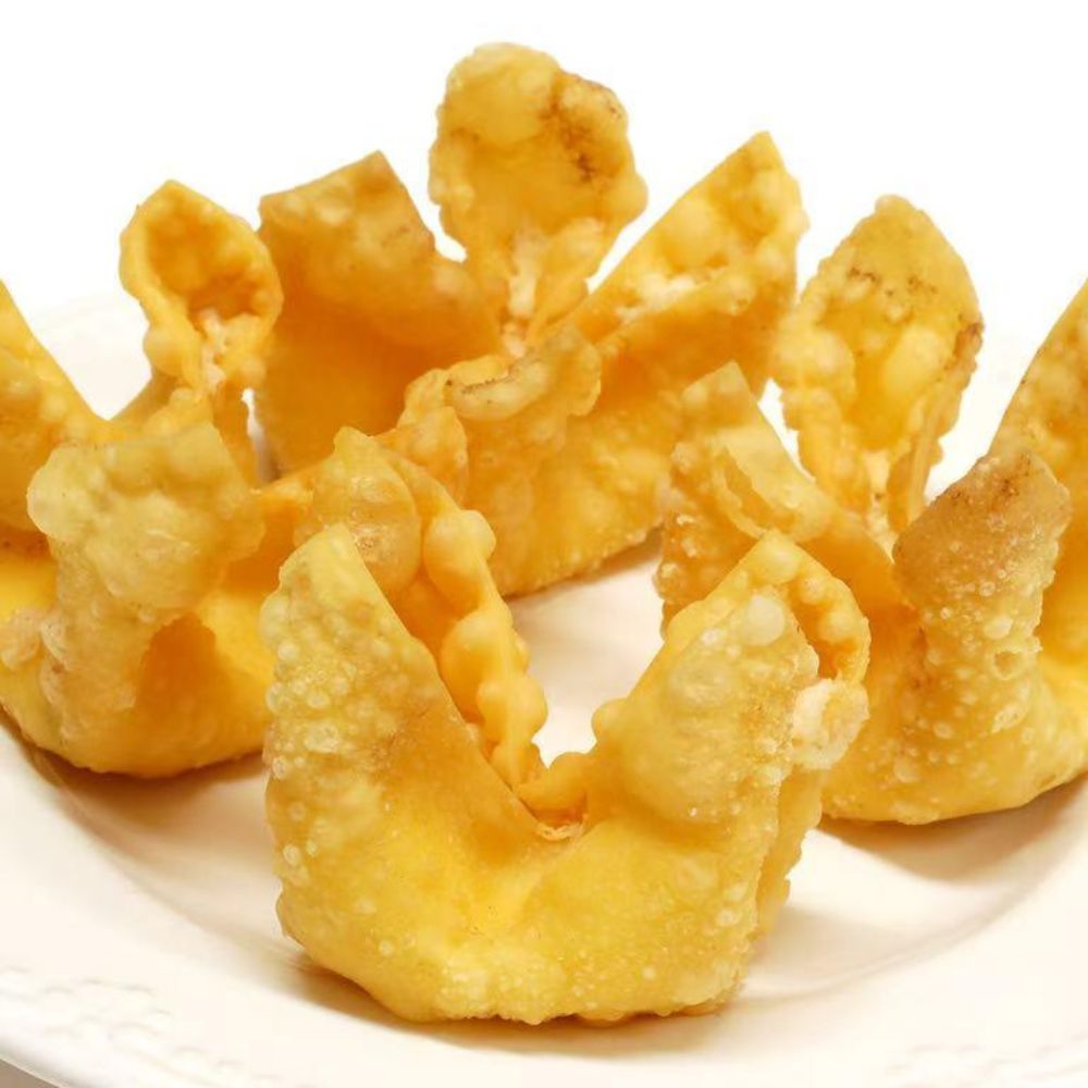 85-Asian-Fusion-Asian-Restaurant-Crab-Rangoon-Choctaw Crispy crab Rangoon on plate at 85 Asian Fusion, a Asian Restaurant in Choctaw.