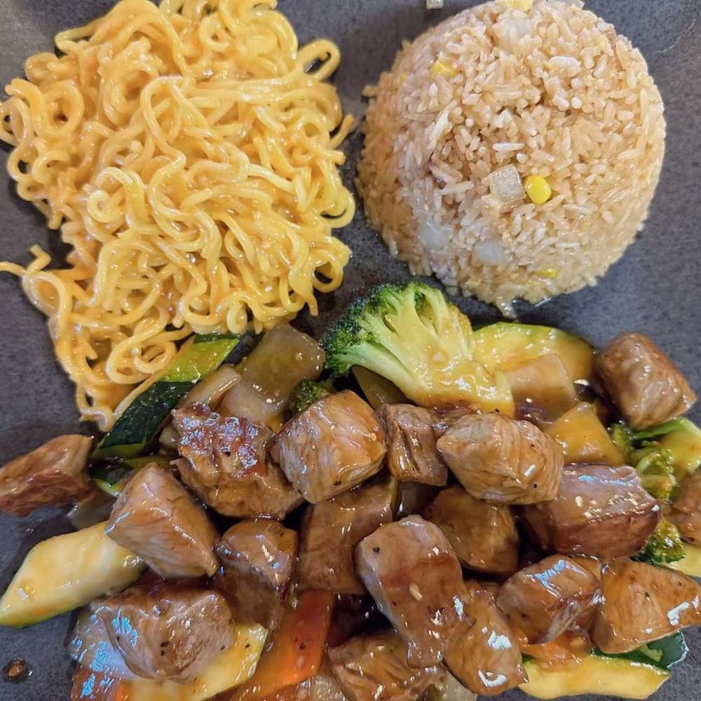 85-Asian-Fusion-Asian-Restaurant-Steak-Teriyaki-Combo-Choctaw Teriyaki steak, noodles, and fried rice with veggies at 85 Asian Fusion, a Asian Restaurant in Choctaw.