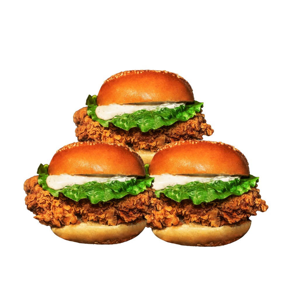 Three classic crispy chicken sandwiches with lettuce and sauce at 98k, a Fried Chicken & Sandwich Shop in NY