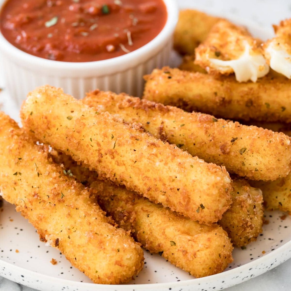 Fried mozzarella sticks with marinara dipping sauce