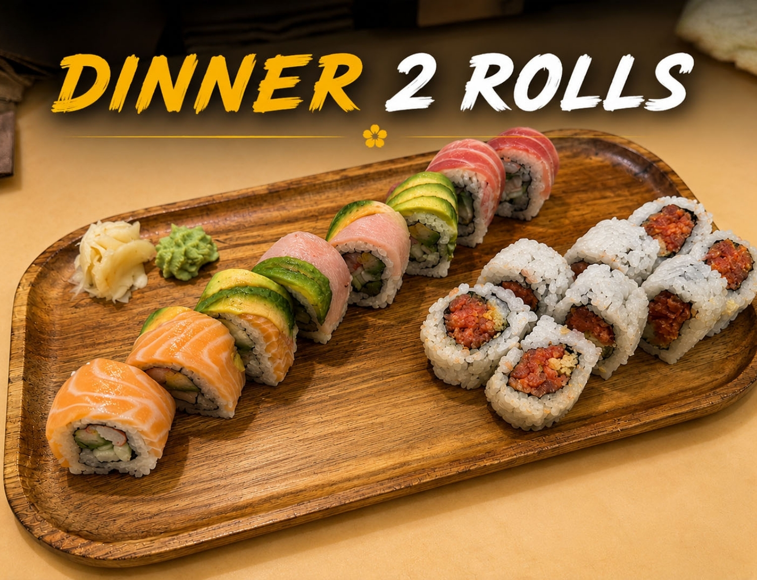 Dinner combo with two kinds of fresh sushi rolls on wood plate.
