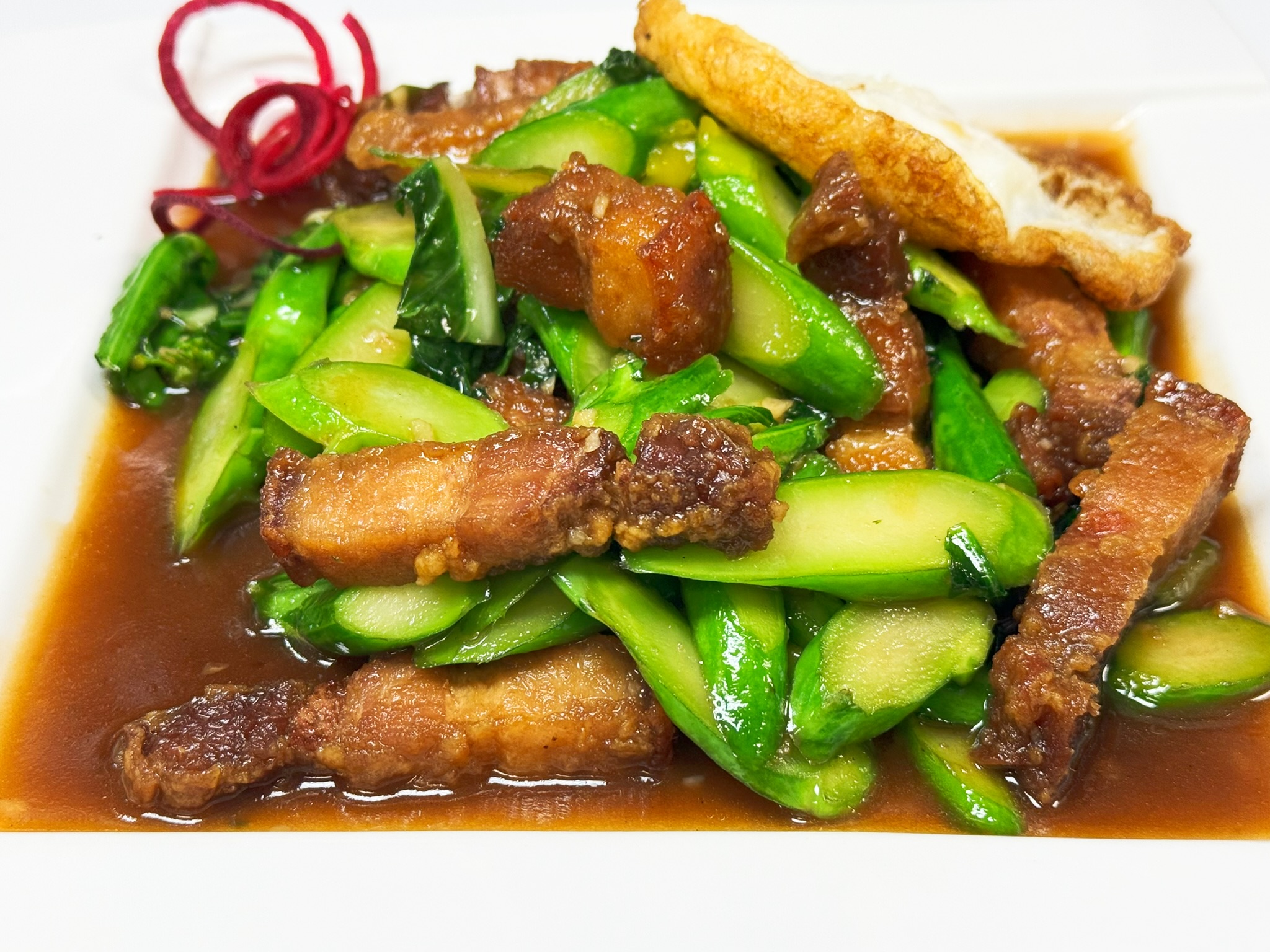 Kana Moo Krob at Absolute Thai Cuisine，a Thai Restaurant in Fulshear