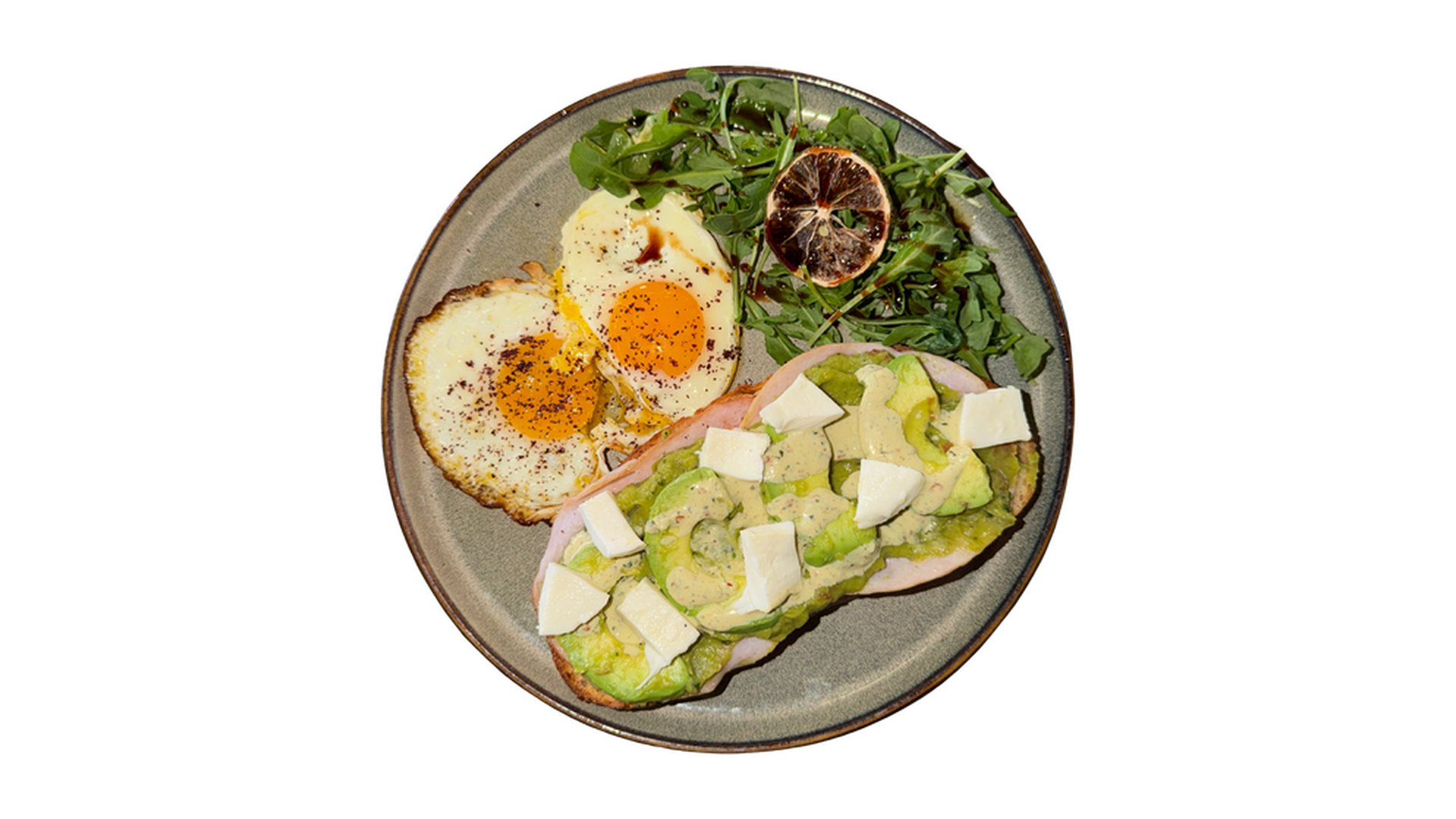 Avocado Sourdough Stack with fried eggs cheese avocado and arugula