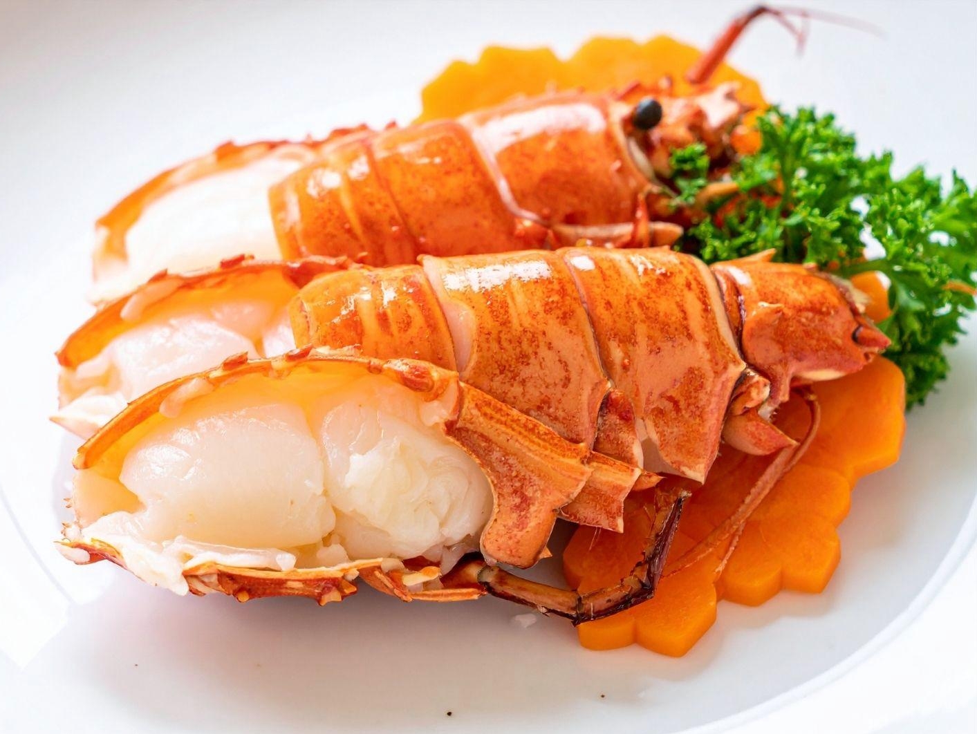 Butter-poached lobster tail with garnish at Ah Ma Hibachi, a Japanese Restaurant in Metairie