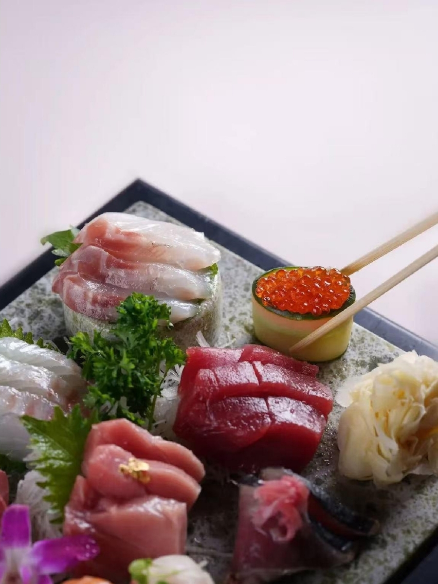 Assortment of premium sashimi including tuna and fish roe at AJI Koharu Sushi & Grill, a Sushi Restaurant in Federal Way