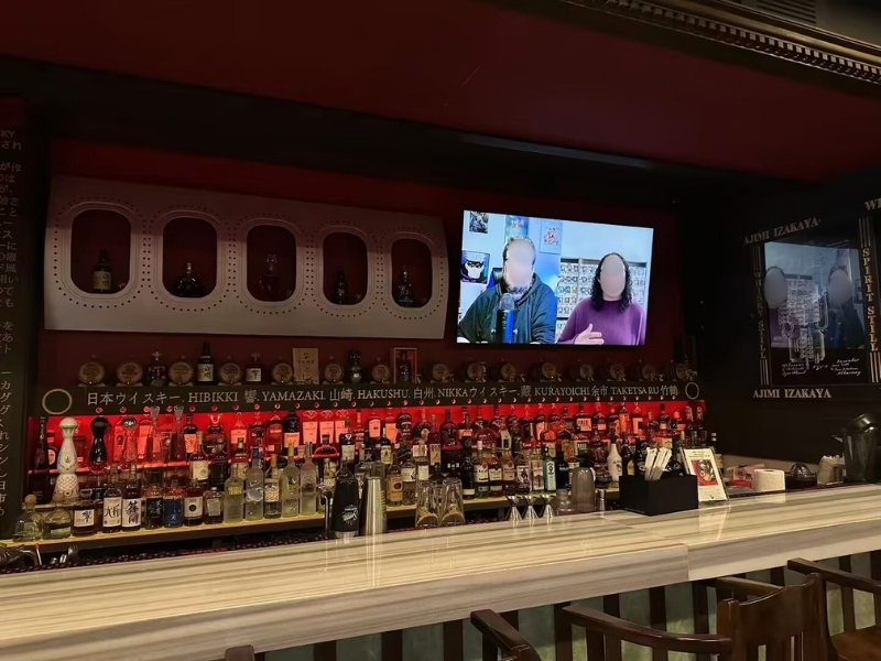 Well-stocked bar area with drinks at Ajimi, a Ramen Restaurant in Brooklyn