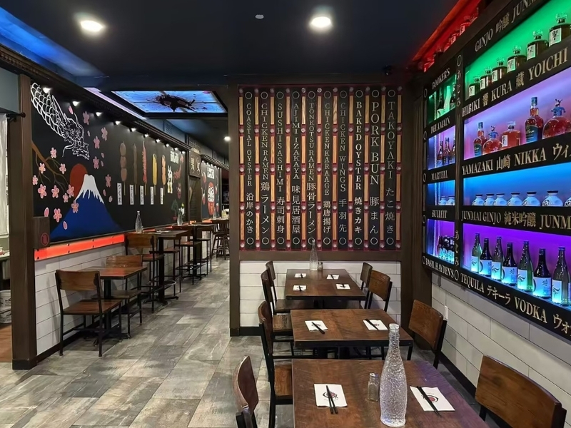 Spacious dining space with themed decor at Ajimi, a Ramen Restaurant in Brooklyn