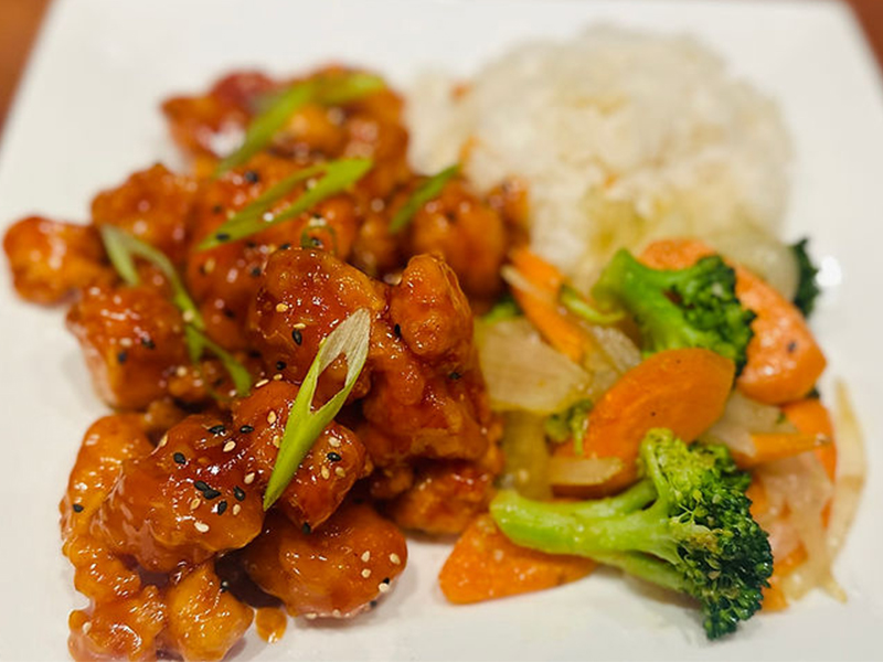 Sesame chicken with rice & veggies at AJ Hibachi Steakhouse, an Asian Restaurant in Cheshire