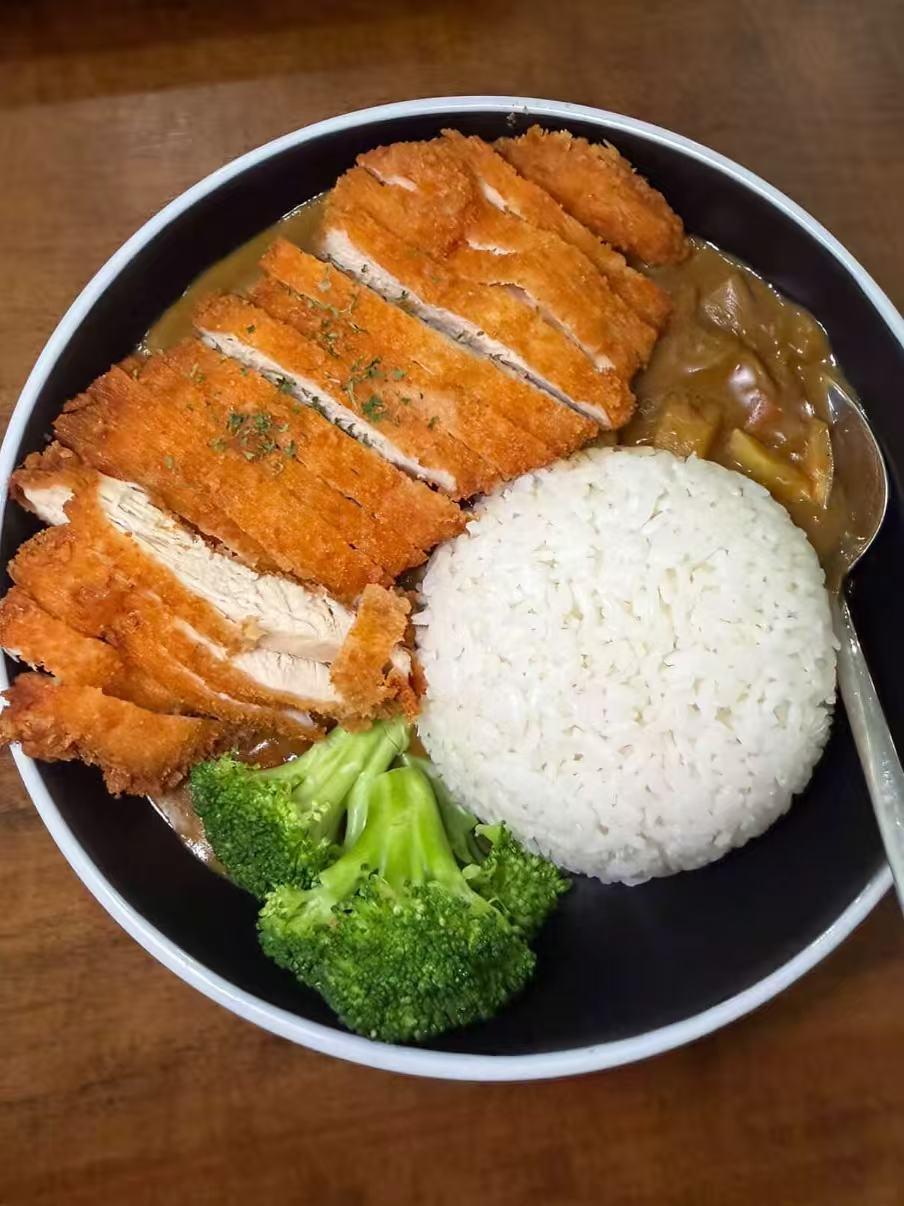Crispy chicken katsu with curry sauce and rice at Akagi, a Japanese restaurant in Rockville