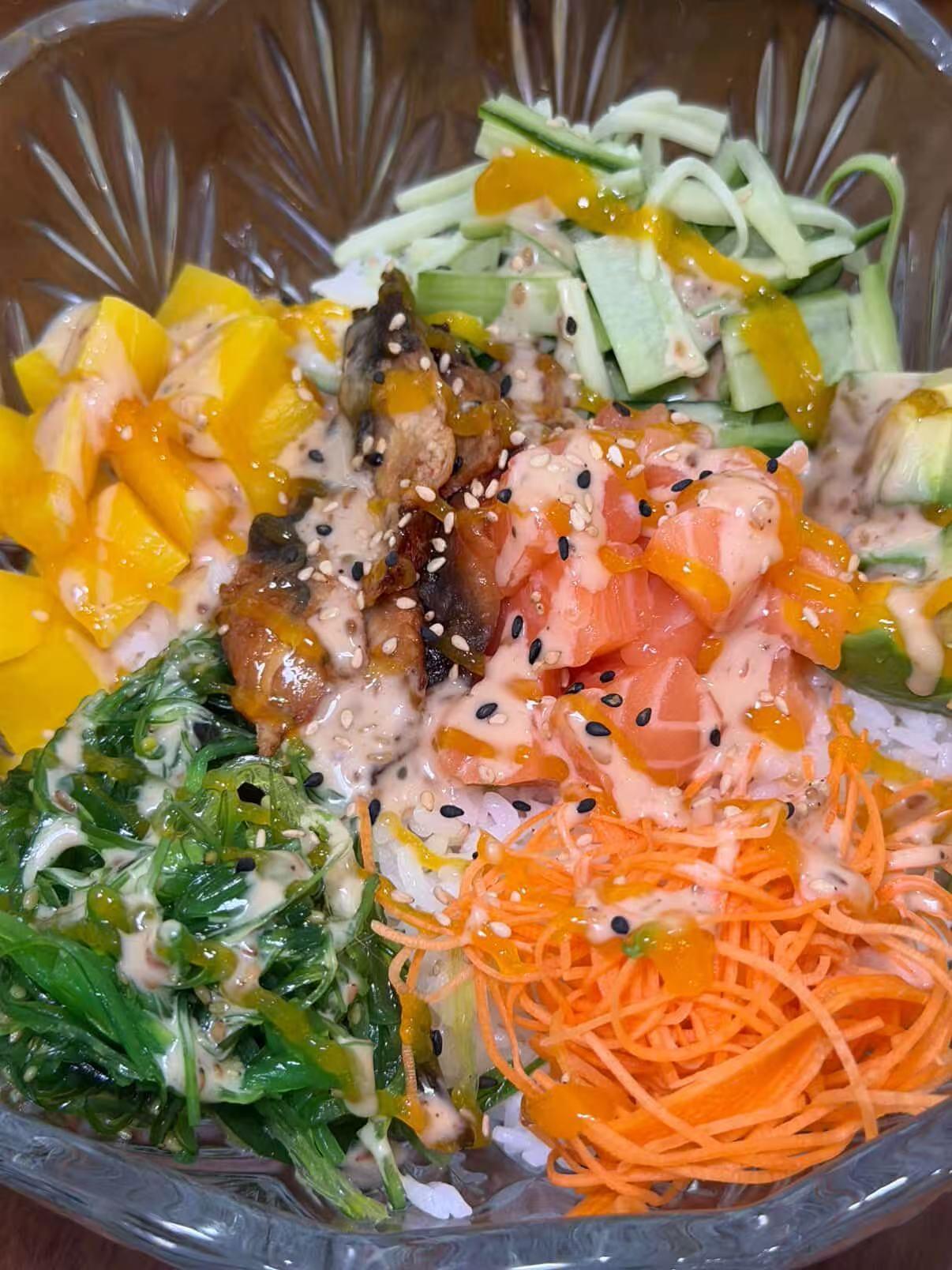 Poke bowl with salmon, mango, veggies and creamy sauce at Akagi, a Japanese restaurant in Rockville