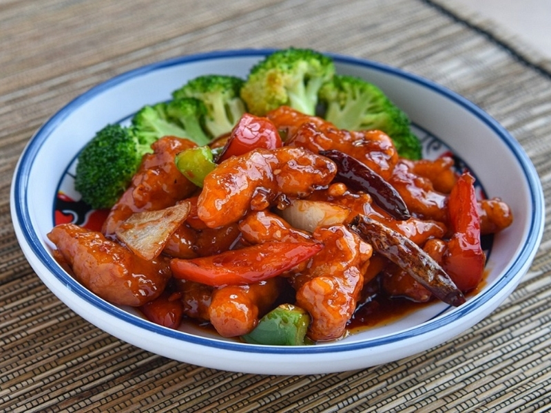 Sweet and spicy General Tso's chicken with veggies at Akahana Asian Bistro Bar & Sushi, a Asian Restaurant in Fort Mill