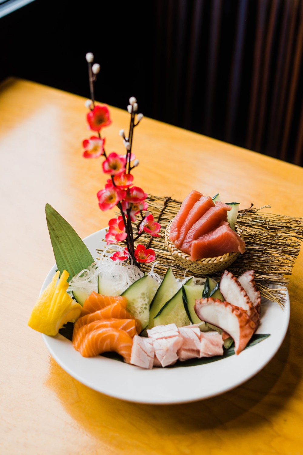 Sashimi platter with salmon, tuna, octopus and garnishes
