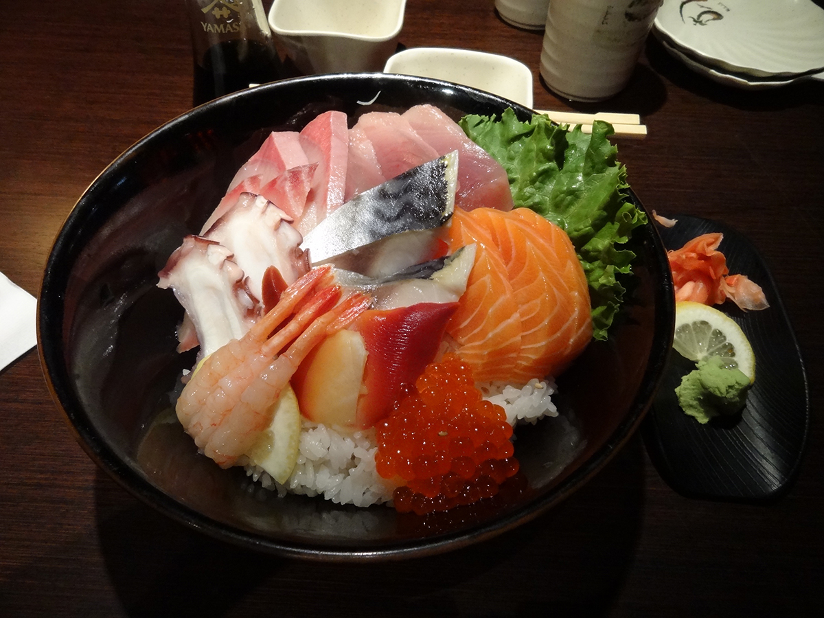 Chirashi sushi bowl with assorted sashimi, salmon roe, and rice at Akiyo, a Japanese Restaurant in Johnson City