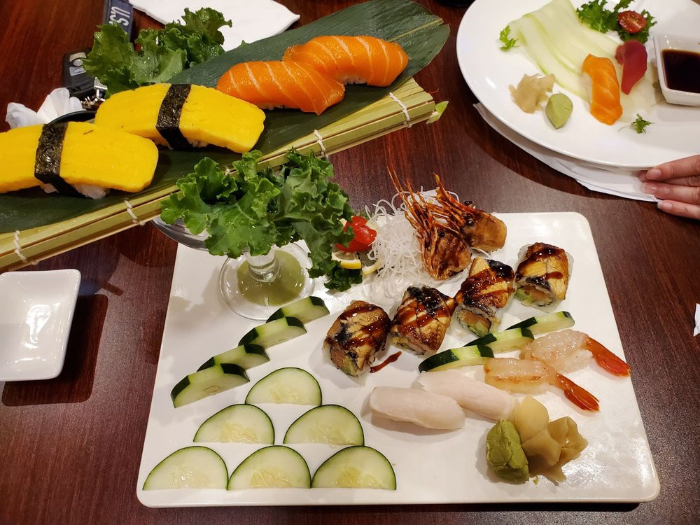 Combination of sushi rolls, nigiri and sashimi, served on platters at Ako Sushi & Seafood, a Japanese Restaurant in Titusville