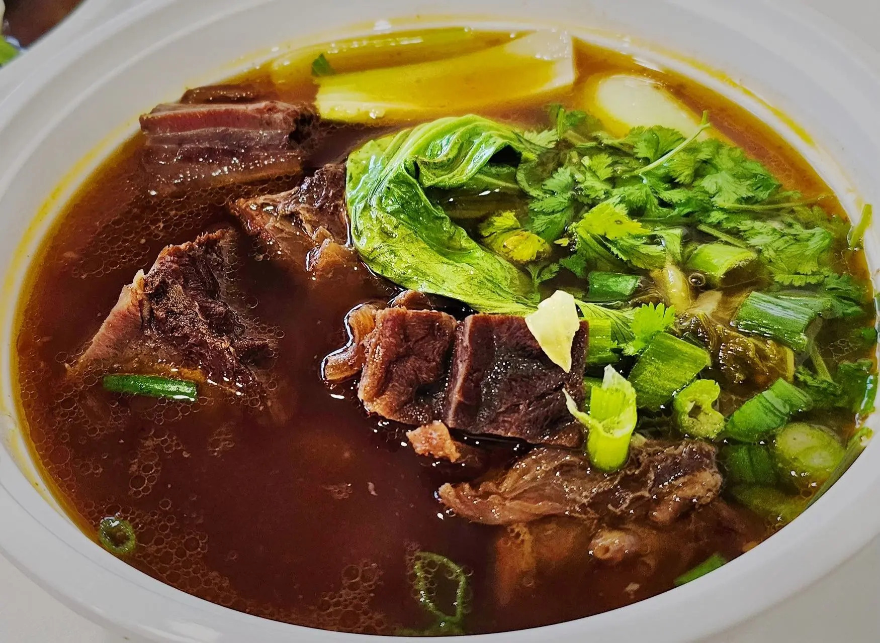 Beef noodle soup with vegetables at All In 牡丹，a Chinese Taiwanese Restaurant in Rowland Heights