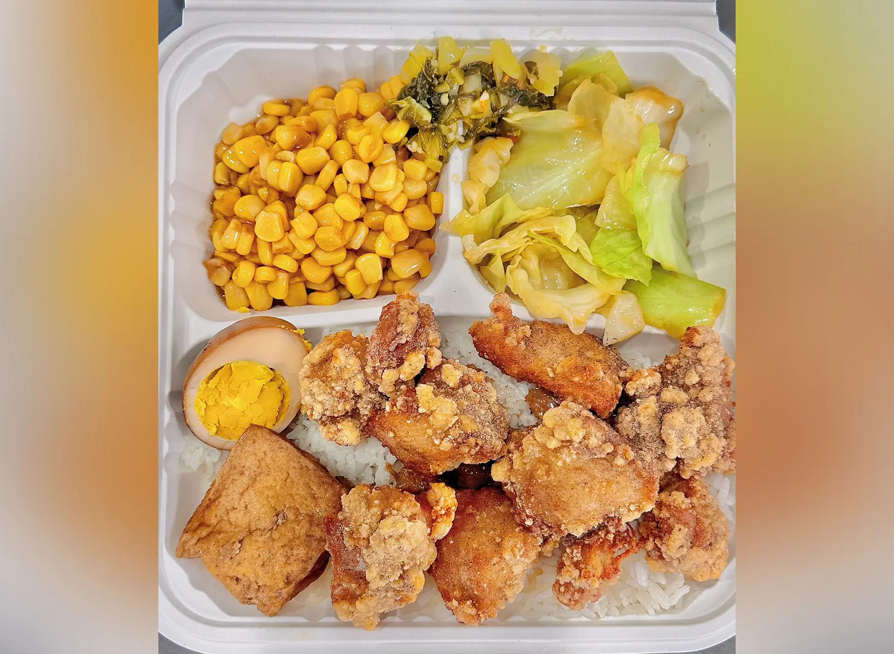 Salted crispy chicken bento box with rice and sides at All In 牡丹，a Chinese Taiwanese Restaurant in Rowland Heights
