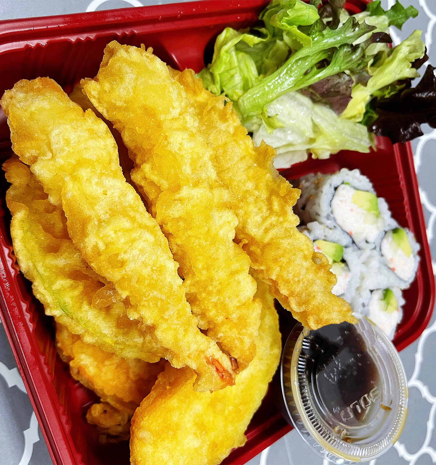 Bento box with shrimp tempura, sushi rolls, salad at Aloha Hawaiian BBQ & Sushi, a Asian Fusion restaurant in Baldwin Park