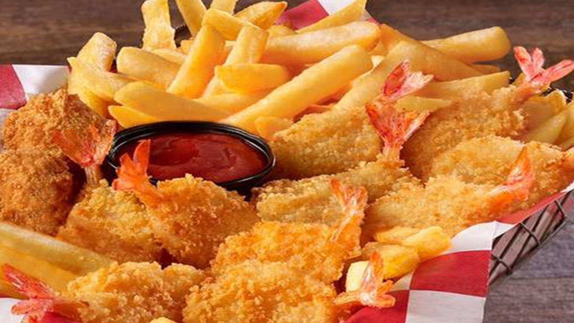Assorted snacks combo with fries, nuggets and dipping sauce at American Chicken Factory, a American Fast Food Restaurant in Lithonia
