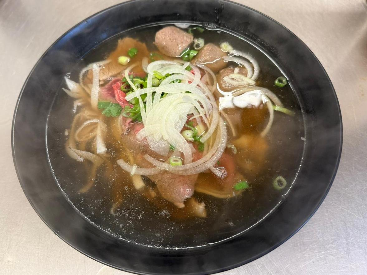 An-Chi-Vietnamese-restaurant-Deluxe-Noodle-Soup-San-Francisco Deluxe Noodle Soup Rich noodle soup with meatballs and sliced meat at An Chi, a Vietnamese restaurant in San Francisco