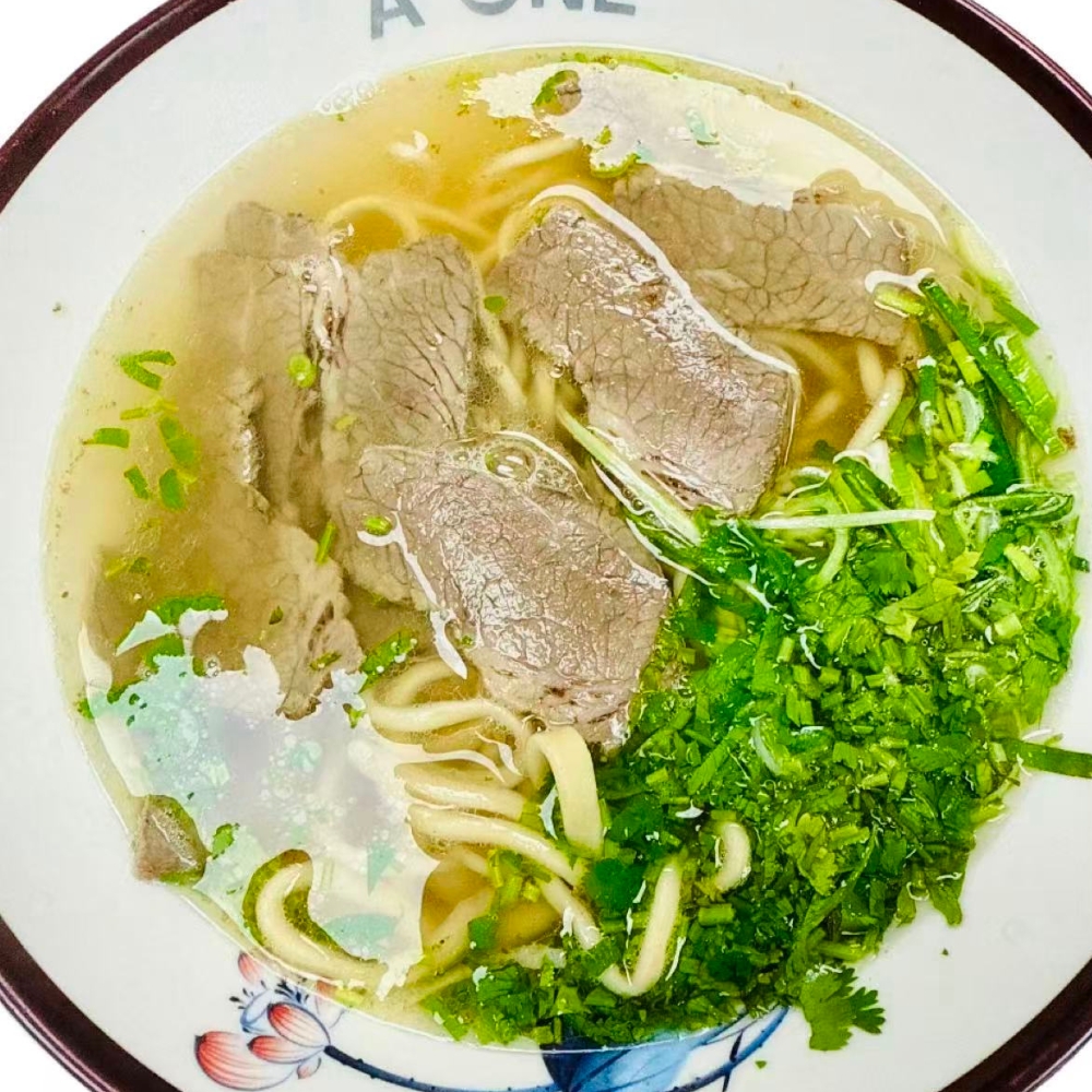 A-One-Dumplings-&-Noodle-Bar-Chinese-Restaurant-Clear-Beef-Noodle-Soup-Houston Clear beef noodle soup with greens at A One Dumplings & Noodle Bar, a Chinese Restaurant in Houston
