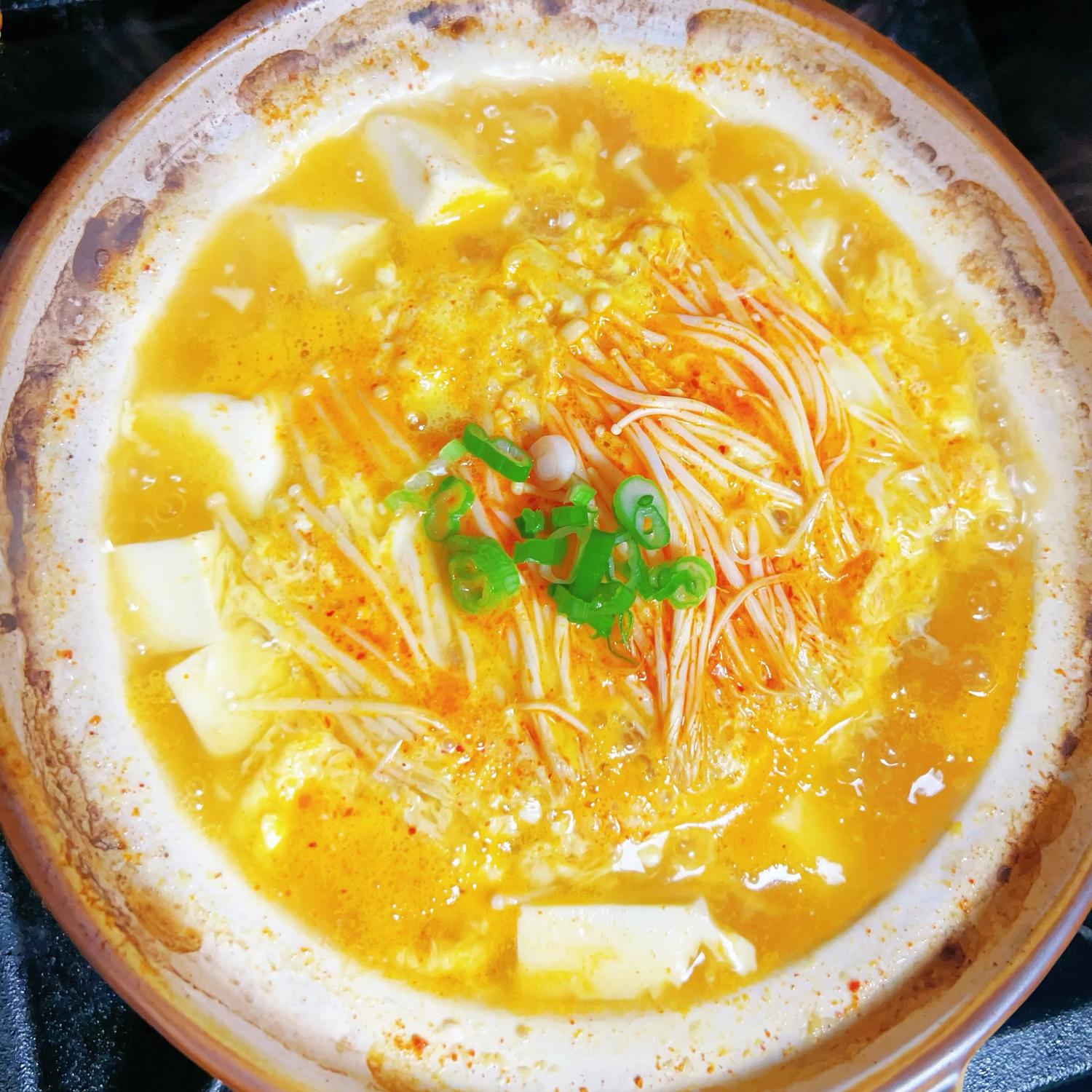 Hot and sour soup with tofu and mushrooms from A⁺砂锅铁板饭, a Chinese restaurant in Flushing