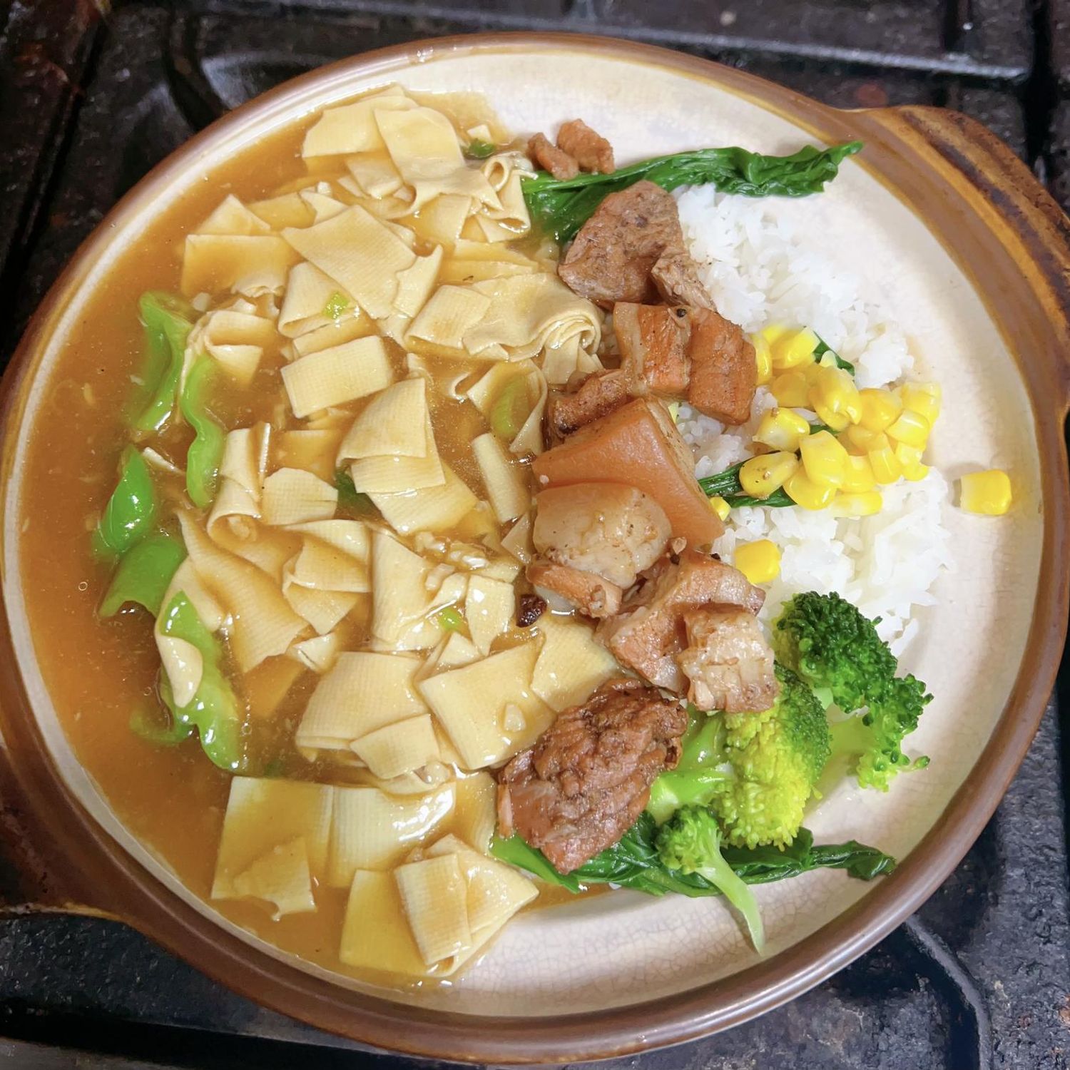 Rice bowl with pork, bamboo shoots, and vegetables from A⁺砂锅铁板饭, a Chinese restaurant in Flushing