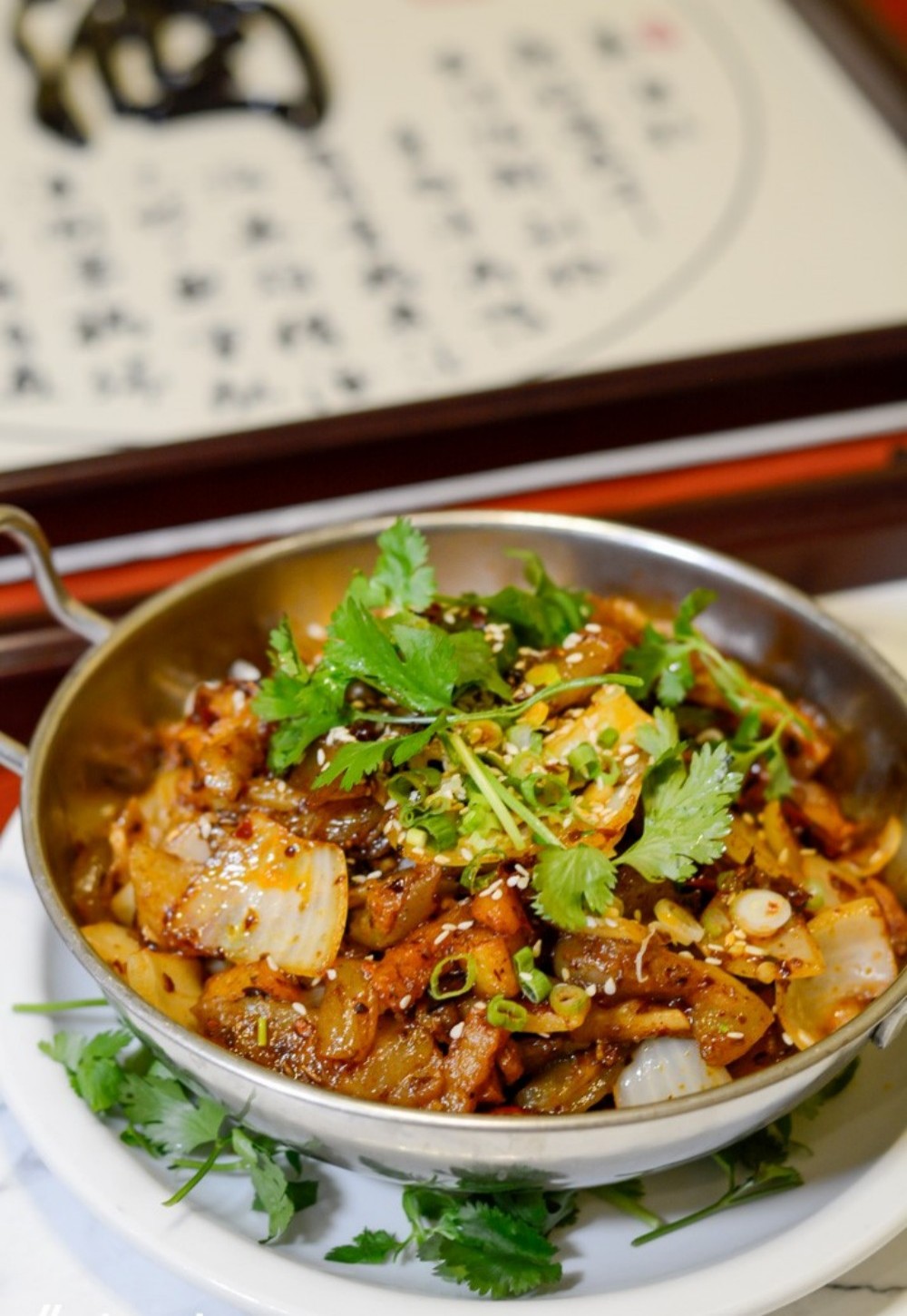 Spicy dry pan pork belly with cilantro at Asia Cafe, a Chinese Restaurant in Austin